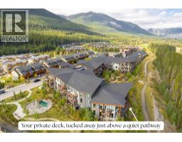 Living room - 114, 106 Stewart Creek Rise, Canmore, AB T1W0N3 Photo 10