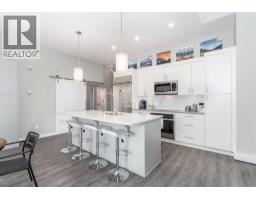 114, 106 Stewart Creek Rise, Canmore, AB T1W0N3 Photo 25