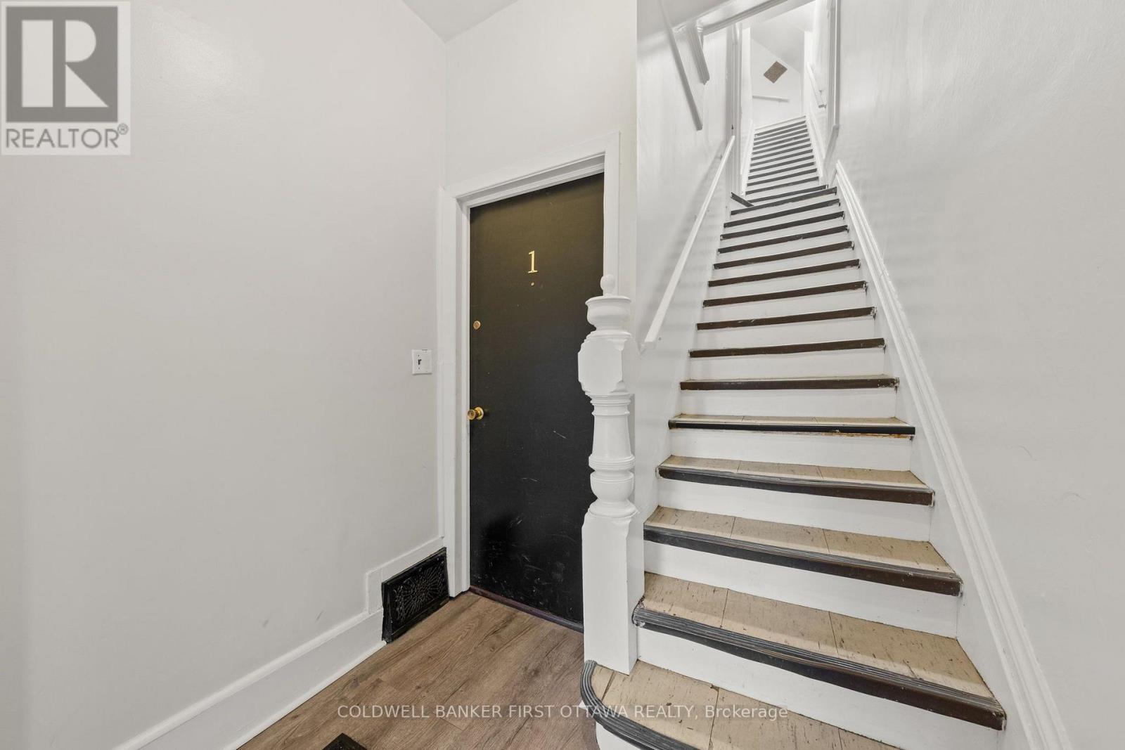 Main common foyer with stairs to unit 2 & 3!