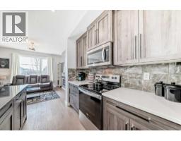 Bedroom - 1016 Lanark Boulevard Se, Airdrie, AB T4A3L6 Photo 7