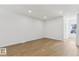 Great room - 319 Edgemont Dr Nw, Edmonton, AB T6M3G7 Photo 8