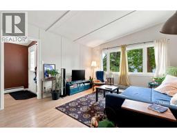 Living room/Dining room - 1212 Rosehill Drive Nw, Calgary, AB T2K1M1 Photo 7