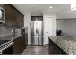 Laundry room - #1 4205 30 St Nw, Edmonton, AB T6T2G9 Photo 7
