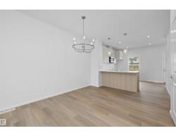 Laundry room - 15656 3 St Ne, Edmonton, AB T5Y4M3 Photo 8