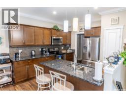 Family room - 201 959 Bradley Street, Moose Jaw, SK S6H5Y4 Photo 11