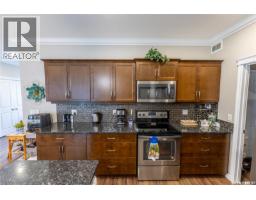Family room - 201 959 Bradley Street, Moose Jaw, SK S6H5Y4 Photo 12