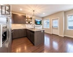 Living room - #115, 300 Marina Drive, Chestermere, AB T1X0P6 Photo 11