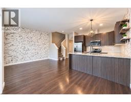 2pc Bathroom - #115, 300 Marina Drive, Chestermere, AB T1X0P6 Photo 8