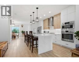1074 Harmony Parade, Rural Rocky View County, AB T3Z0H1 Photo 13