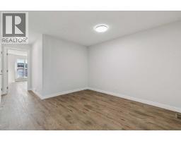 Family room - 72 Creekview Common Sw, Calgary, AB T2X4Y1 Photo 11