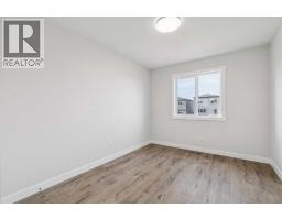 Living room - 72 Creekview Common Sw, Calgary, AB T2X4Y1 Photo 13