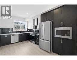 Primary Bedroom - 108, 8235 8 Avenue Sw, Calgary, AB T3H6H2 Photo 9