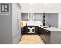 413 55 Klahanie Drive, Port Moody, BC V3H0M9 Photo 14