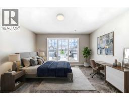 Primary Bedroom - 50 Magnolia Gardens Se, Calgary, AB T3M2P6 Photo 7