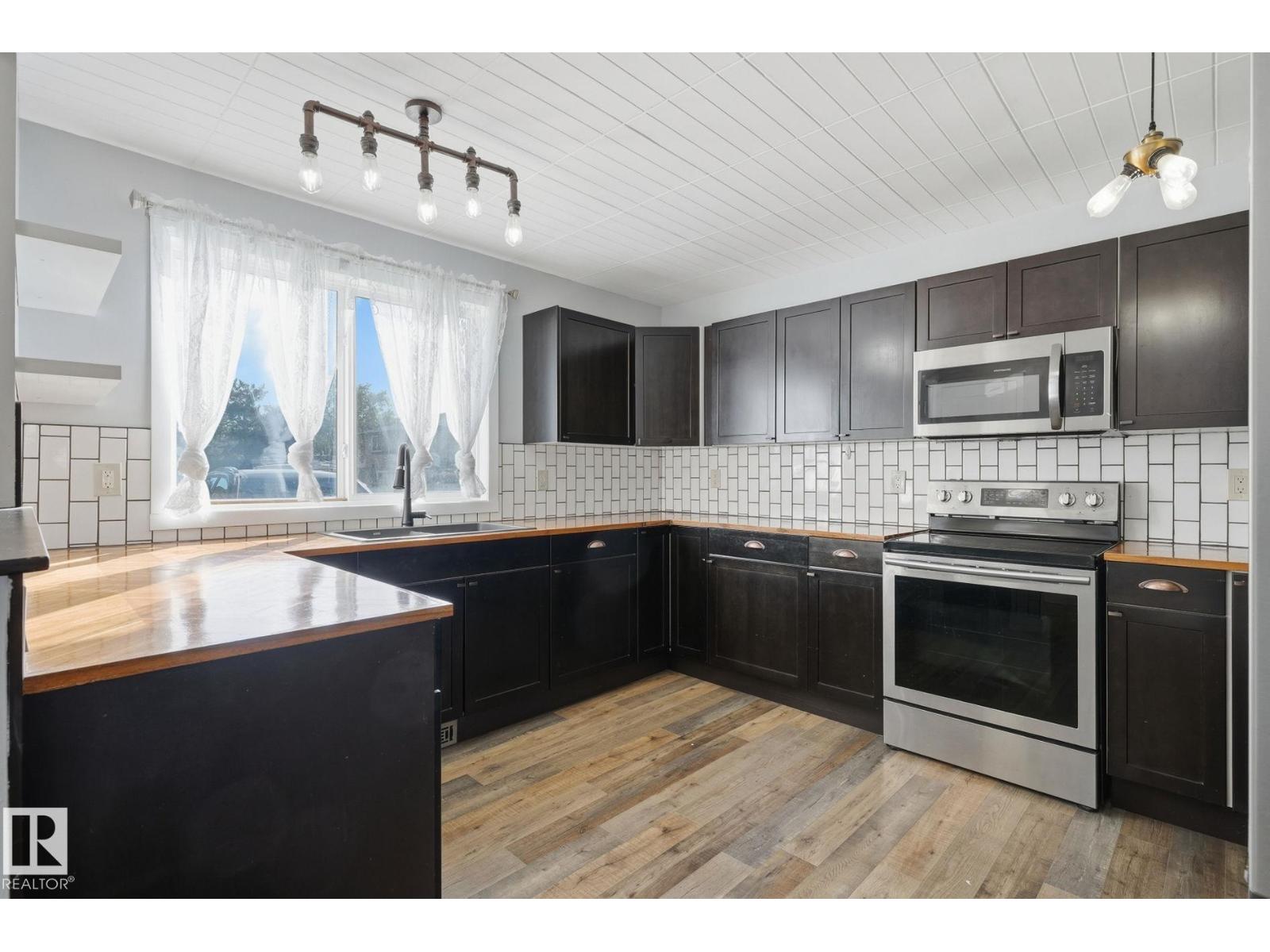 7 8930 99 Av, Pineview Fort Sask. — photo 1 of 30