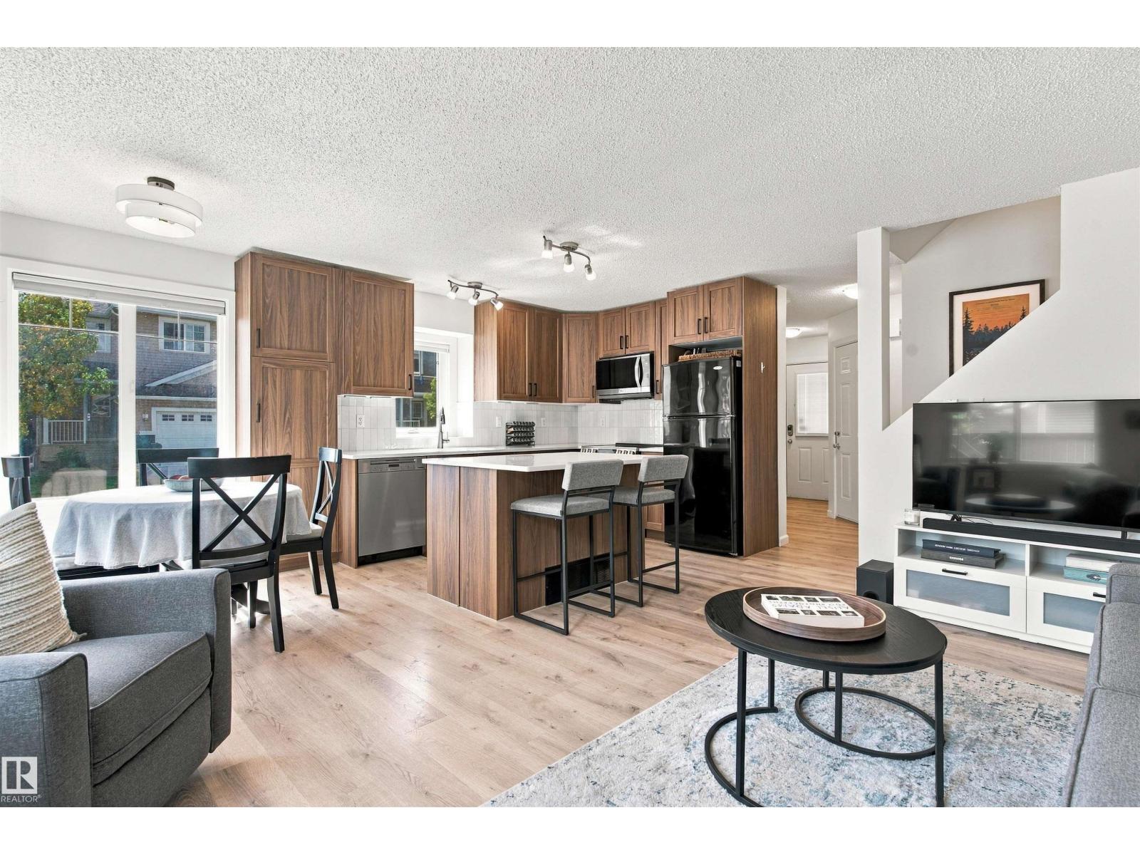#60 120 MAGRATH RD NW - 17