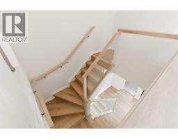 4 Kingsland Villas Sw, Calgary, AB T2V5J9 Photo 35