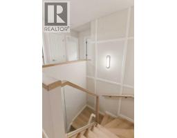 4 Kingsland Villas Sw, Calgary, AB T2V5J9 Photo 24