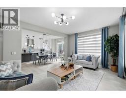 Family room - 112 Cityside Park Ne, Calgary, AB T3N1J2 Photo 15
