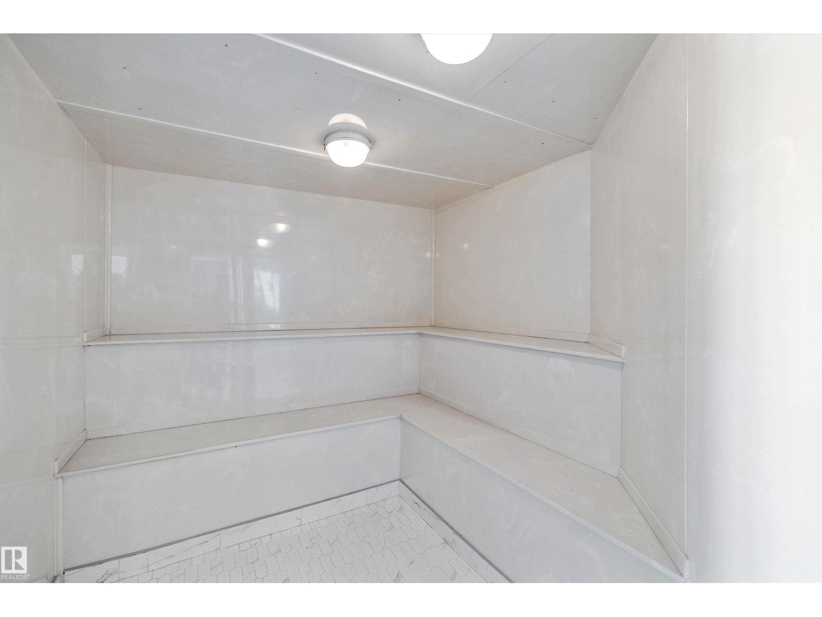 #401 237 YOUVILLE DR E NW - 56