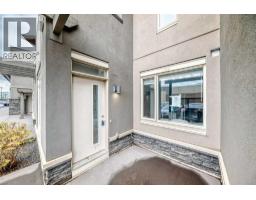 Living room - 109, 10 Westpark Link Sw, Calgary, AB T3H0Y5 Photo 6