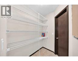 Bedroom - 27 Pantego Way Nw, Calgary, AB T3K0C3 Photo 17