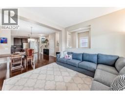 Living room - 199 River Heights Green, Cochrane, AB T4C0S3 Photo 7