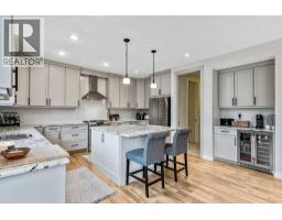 Laundry room - 19 Cimarron Estates Manor, Okotoks, AB T1S0J8 Photo 11