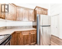 Bedroom - 119, 50 Lucky Place, Sylvan Lake, AB T4S0E3 Photo 7