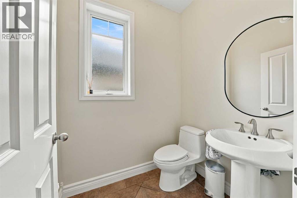 Main level two-piece bathroom