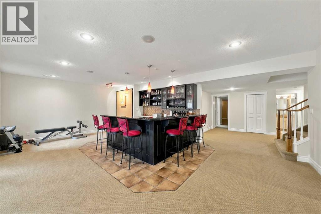 Walkout basement wet-bar and games / recreation room
