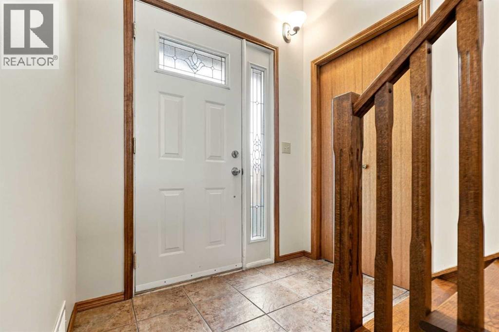 Front entrance with a coat closet