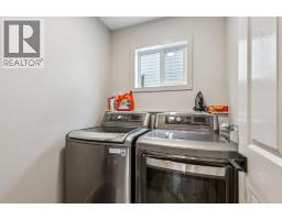 2pc Bathroom - 1011 Creek Springs Rise Nw, Airdrie, AB T4B2R6 Photo 11