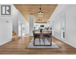 Den - 303 Woodside Place, Okotoks, AB T1S1L9 Photo 13