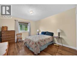 Bedroom - 1008 2 Street Ne, Sundre, AB T0M1X0 Photo 12