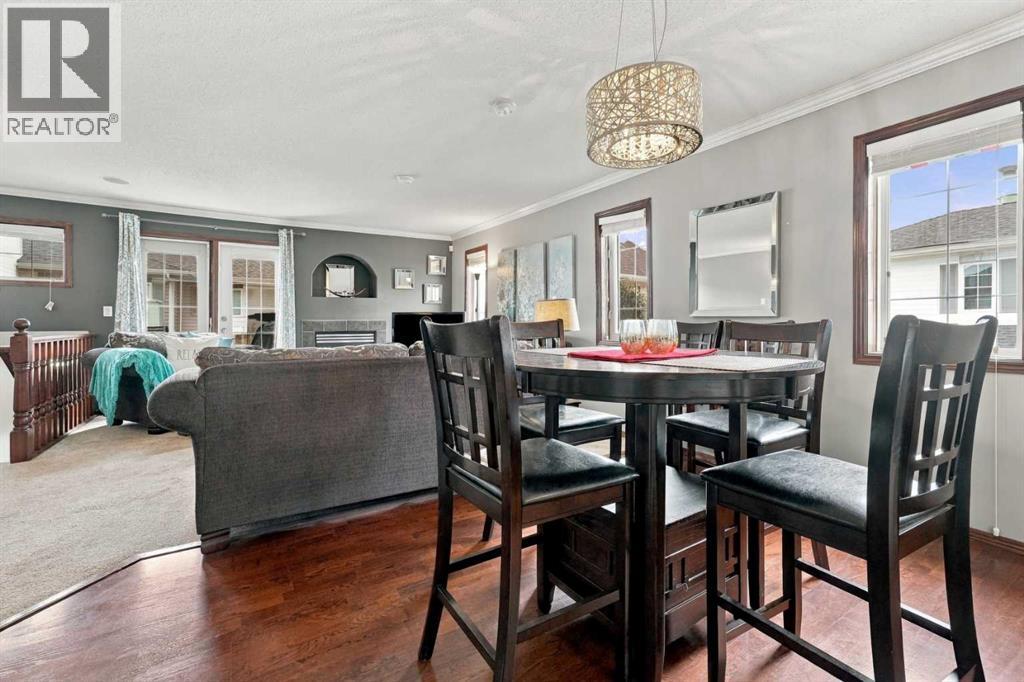 The home offers attractive curb appeal, highlighted by a covered front entrance concrete patio