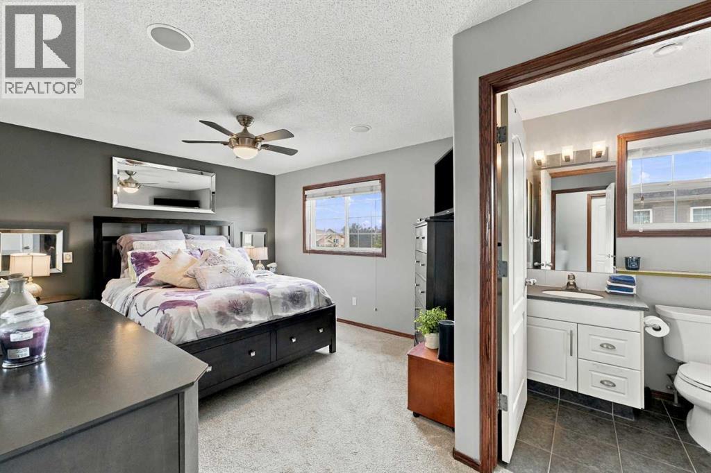 The home offers attractive curb appeal, highlighted by a covered front entrance concrete patio
