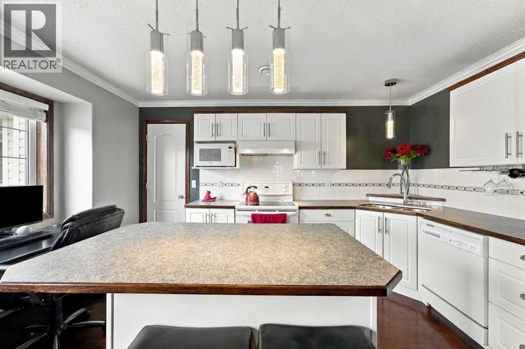 The home offers attractive curb appeal, highlighted by a covered front entrance concrete patio