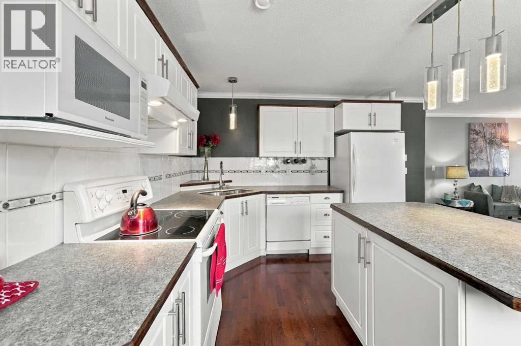 The home offers attractive curb appeal, highlighted by a covered front entrance concrete patio
