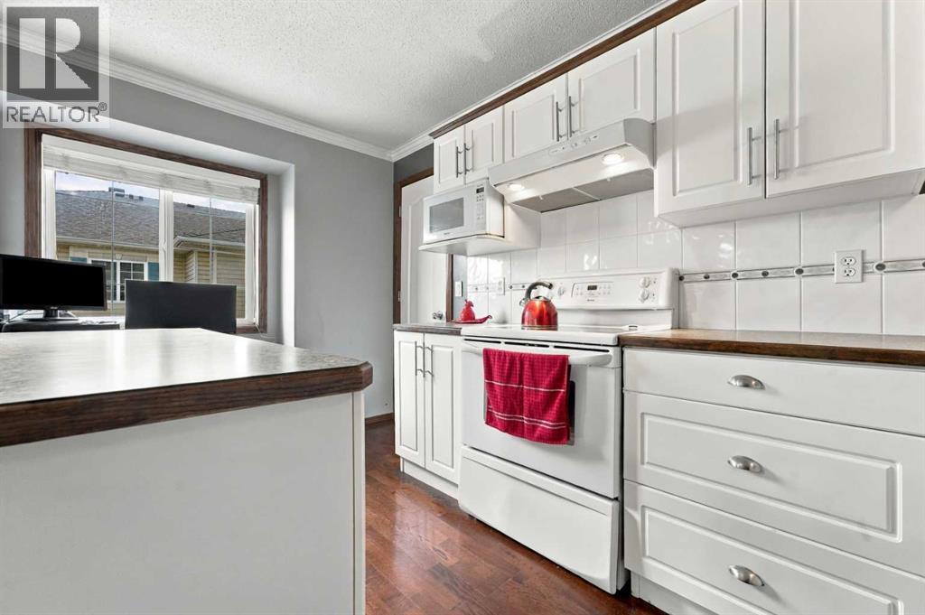 The home offers attractive curb appeal, highlighted by a covered front entrance concrete patio