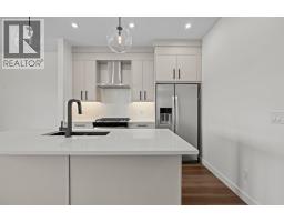 Laundry room - 2252 Waterbury Road, Chestermere, AB T1X2Y9 Photo 11