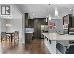 Family room - 151 Stonemere Green, Chestermere, AB T1X0S2 Photo 10