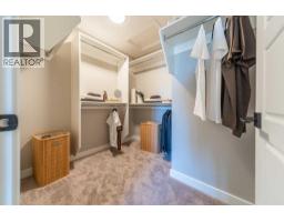 Laundry room - 87 Silverberry Way, Rural Rocky View County, AB T4B5Z8 Photo 15