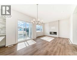 Living room/Dining room - 46 Verdure Place Sw, Calgary, AB T2Y1C9 Photo 18