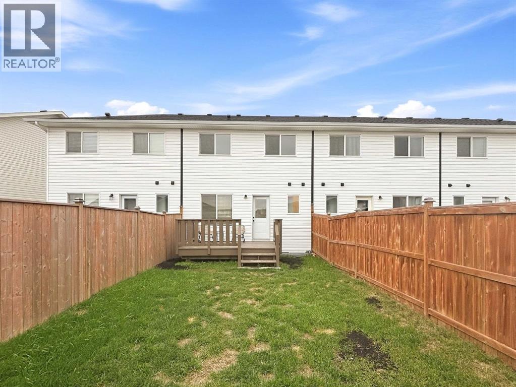 Listing photo – 108 Memorial Parkway, Rural Red Deer County
