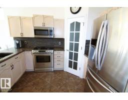 Utility room - 3115 135 Av Nw, Edmonton, AB T5A5E3 Photo 10