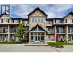 1222, 211 Aspen Stone Boulevard SW - photo 1