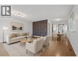 Living room - 205 15 Avenue Ne, Calgary, AB T2E1H1 Photo 6