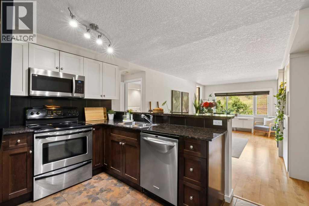 302, 716 3 Avenue NW - photo 11