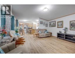 Living room - 116, 15 Mackenzie Ranch, Lacombe, AB T4L0B4 Photo 8